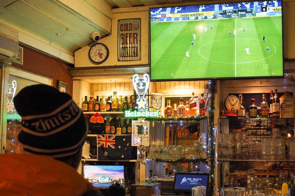 Fans watching live sport at Ned Kelly's